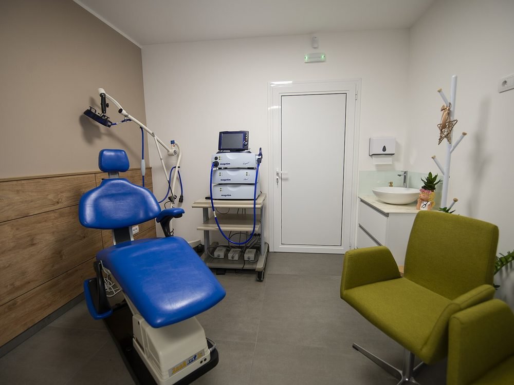 Clean physiotherapy treatment room prepared for a patient visit